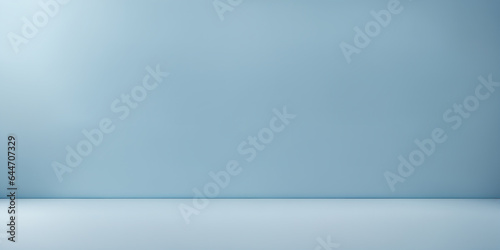 clean baby blue backdrop background for product presentation. Empty room with blue wall..