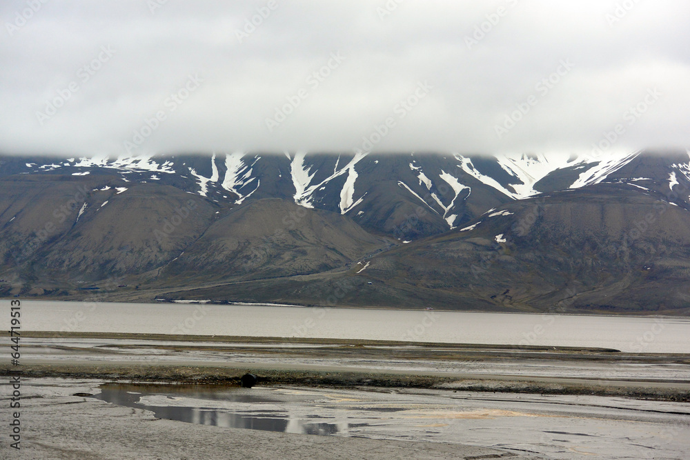 snow covered mountains in beautiful svalbard 