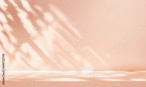 Beautiful original background image of an empty space in pink tones with a play of light and shadow on the wall and floor for design or creative work. photo