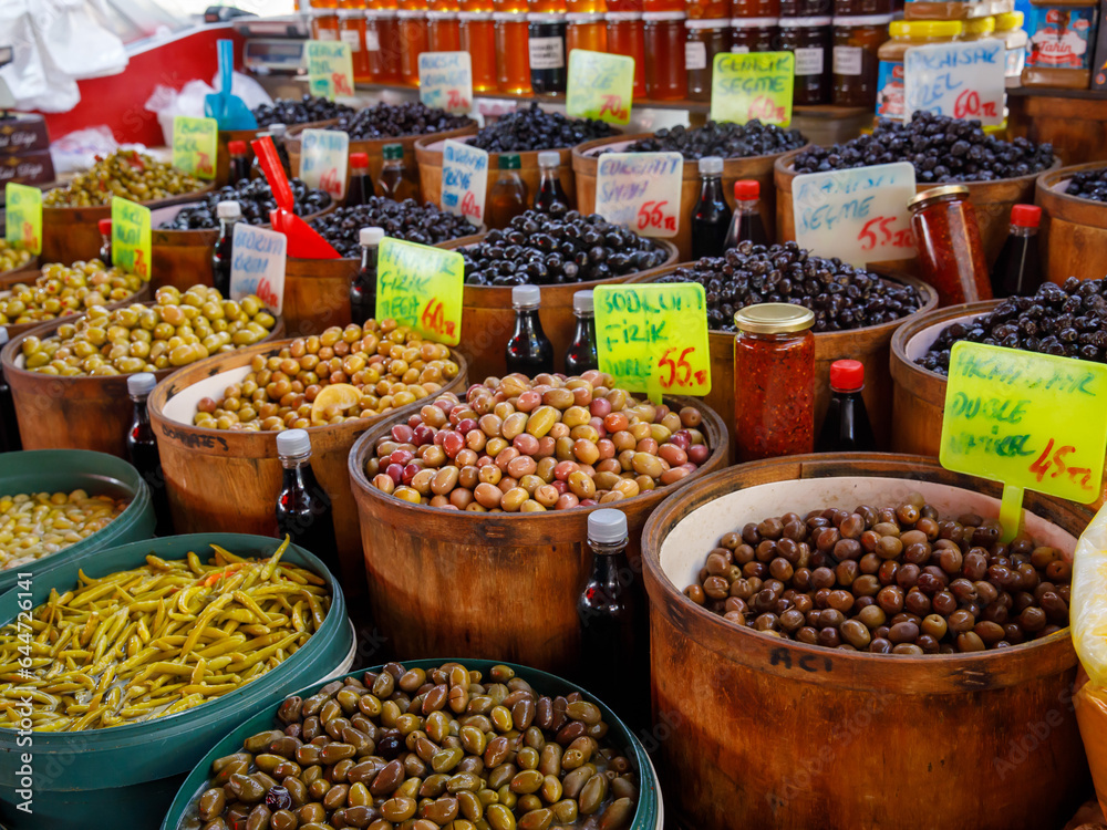 Various types of salted and pickled green and black olives at local farmers market, Alanya, Antalya, Turkey, 17 july 2022