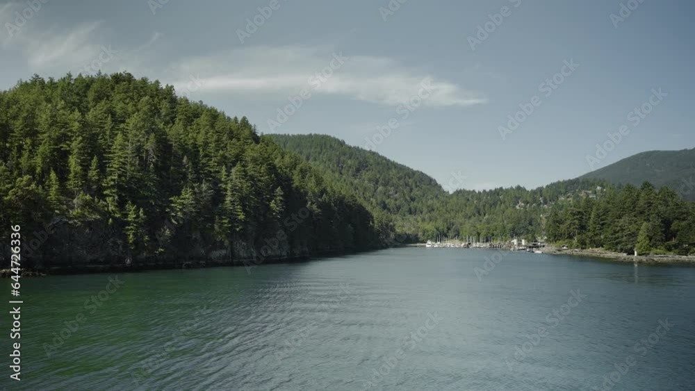 Approaching Bowen Island by sea, gimbal shot. Approaching Bowen Island by sea, gimbal shot.