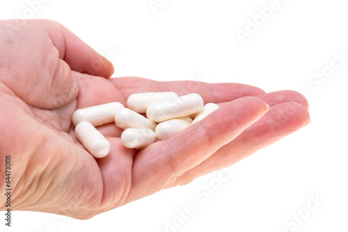 medical capsules in hand isolated