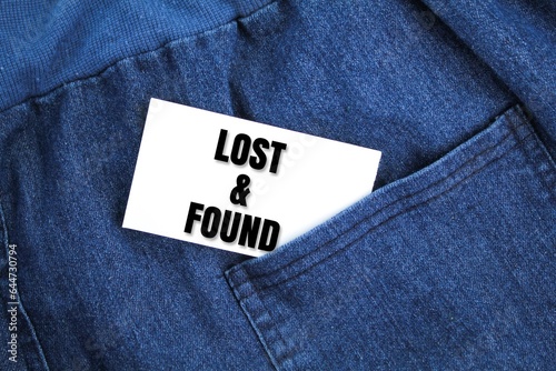 cloth and white paper with the words lost & found. the concept of lost and found. looking for something valuable