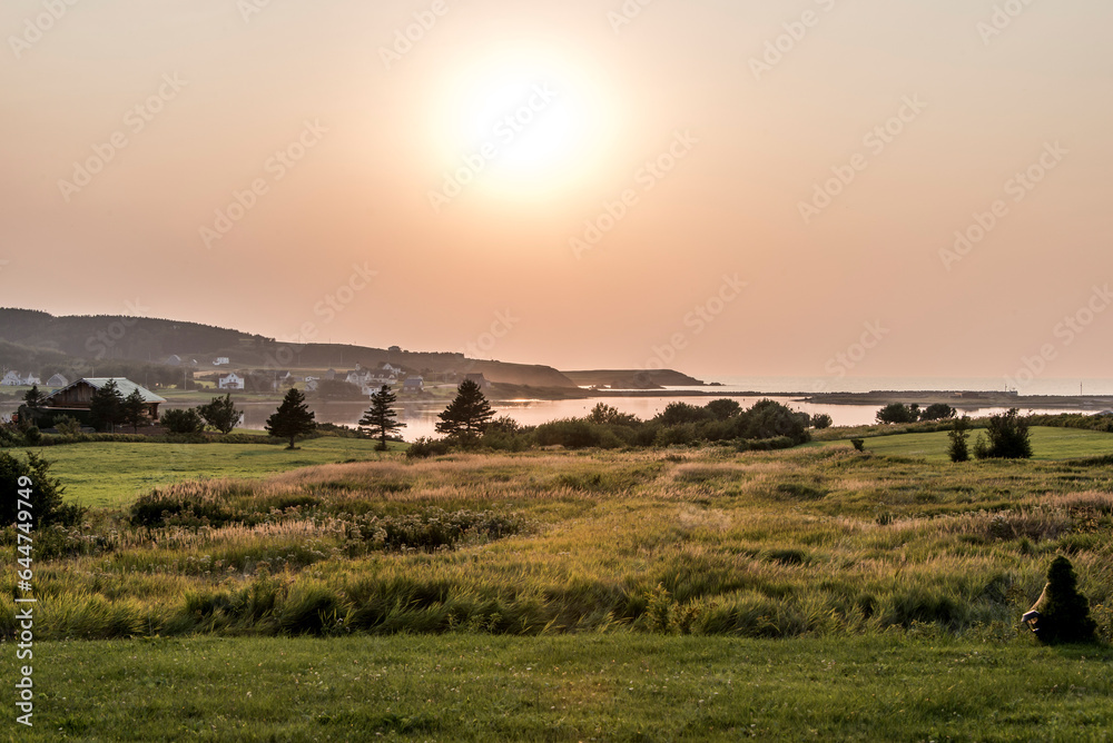 Fototapeta premium Stunning Sunset panoramic view Cape Breton Island Coast line cliff Cabot Trail route, Nova Scotia Highlands Canada