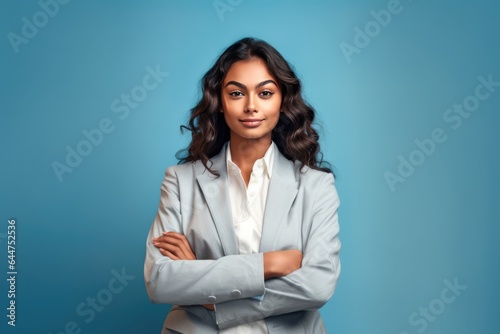 Fictional Character Created By Generated AI.Confident Businesswoman in Blue Jacket and White Blouse