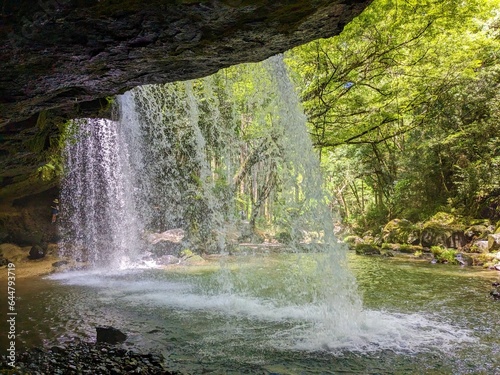 The Nabegataki Falls, where travelers can access the large cavern behind the falls photo