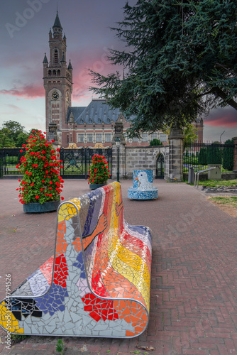 The Hague, Holland-July 26 2023: View of facade of Peace Palace with some mosaic benchs in front of the building