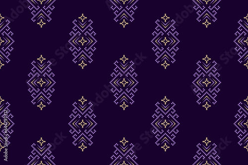 Purple cross stitch traditional ethnic pattern paisley flower Ikat background abstract Aztec African Indonesian Indian seamless pattern for fabric print cloth dress carpet curtains and sarong