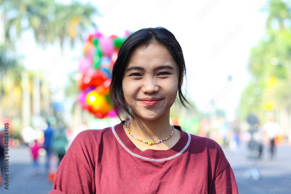 cheerful asian young woman smiling excited in the summer festival, music festival having fun with diverse people cheerful asian young woman smiling excited in the summer festival, music festival having fun with diverse people