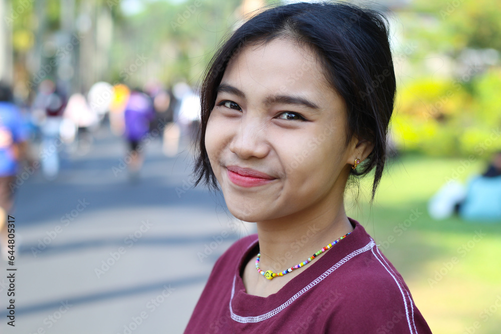 cheerful asian young woman smiling excited in the summer festival, music festival having fun with diverse people cheerful asian young woman smiling excited in the summer festival, music festival having fun with diverse people