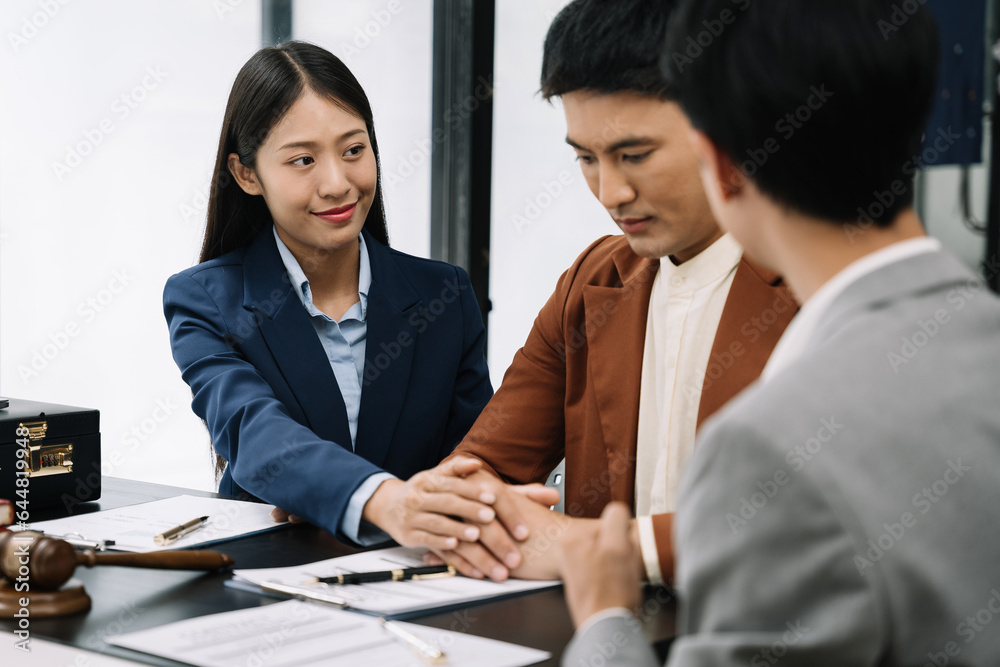 Lawyer comforts his clients with legal advice and serious stress trust commitment for justice issues and lawyer concepts. Lawyer comforts his clients with legal advice and serious stress trust commitment for justice issues and lawyer concepts.