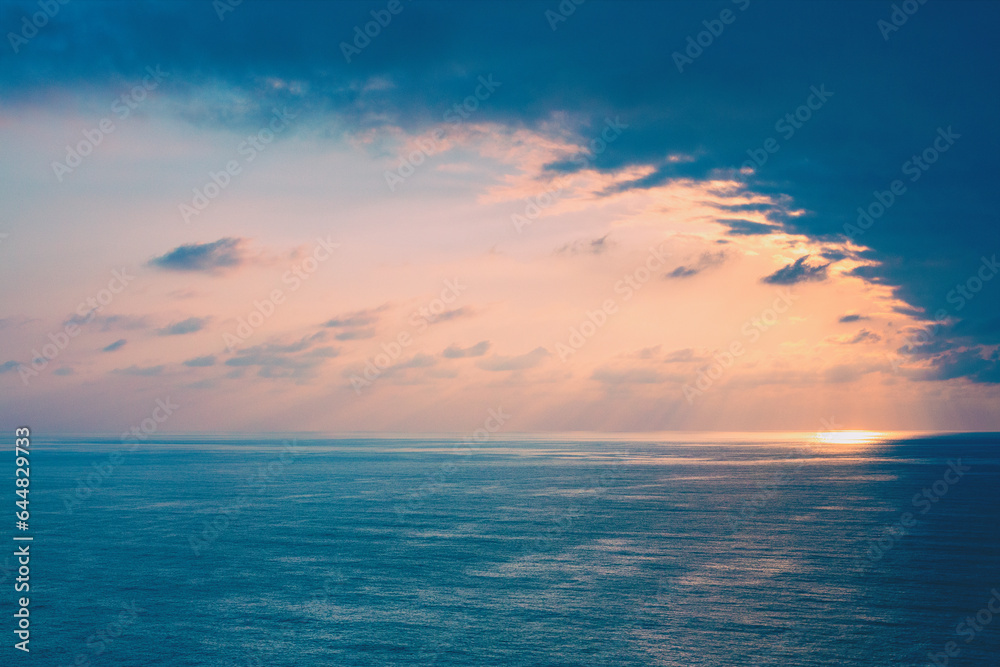 Seascape in the early morning, beautiful sunrise over the calm sea. Nature landscape