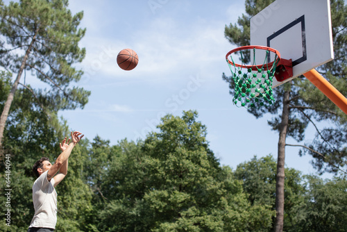 basketball player in action scoring
