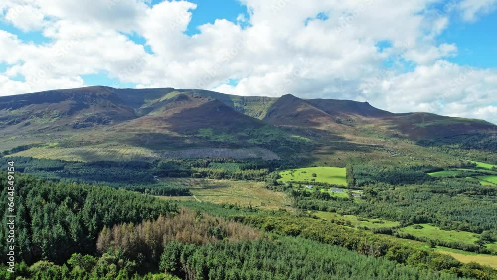 static drone shot of the Comeragh Mountain Range Waterford Ireland on a warm summer night static drone shot of the Comeragh Mountain Range Waterford Ireland on a warm summer night