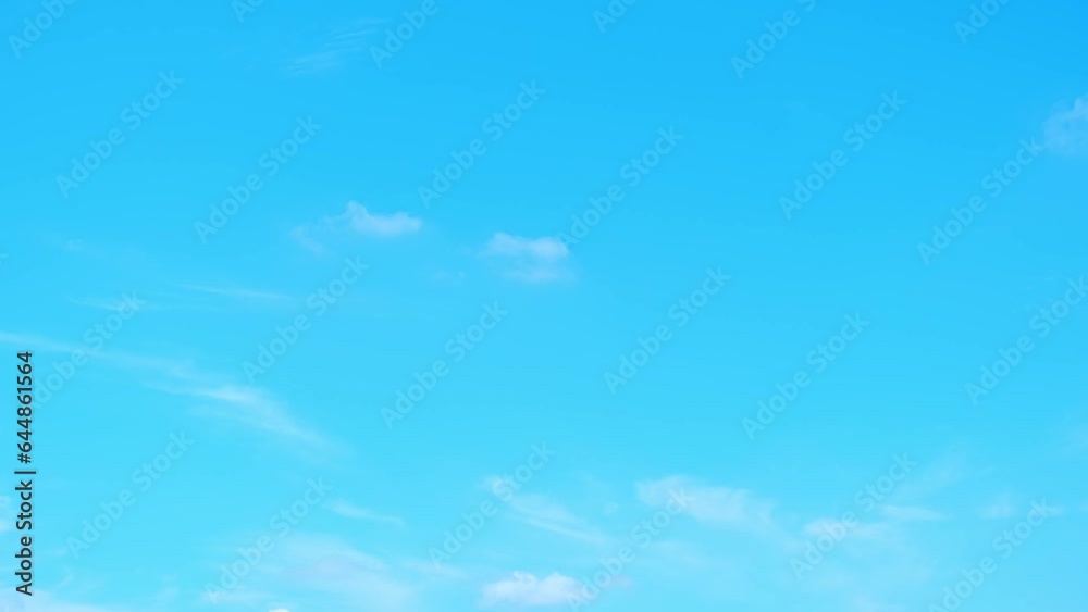 Time lapse of blue sky, its rich hue extending endlessly. Majestic clouds gracefully dance across, morphing into an array of shapes and adding a touch of enchantment to the breathtaking scenery. 4K
Time lapse of blue sky, its rich hue extending endlessly. Majestic clouds gracefully dance across, morphing into an array of shapes and adding a touch of enchantment to the breathtaking scenery. 4K