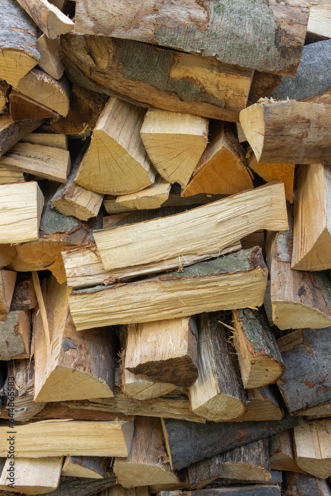 Firewood on pile, close up view