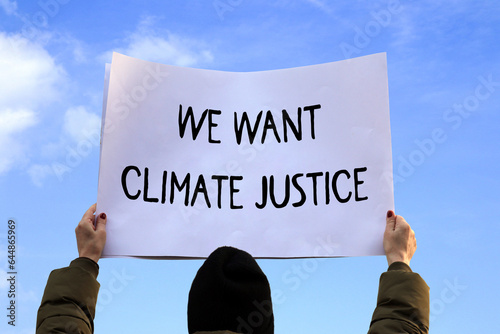 we want climate justice protest schild