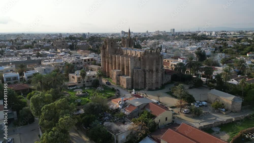 Aerial view of impressive gothic cathedral turned into a mosque (Lala Mustafa Pasa Camii) in old town of Famagusta in Northern Cyprus
Aerial view of impressive gothic cathedral turned into a mosque (Lala Mustafa Pasa Camii) in old town of Famagusta in Northern Cyprus