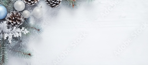 Festive mockup Xmas design with tree branch cone and white frame isolated pastel background Copy space