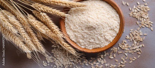 Selective focus on psyllium husk or isabgol a fiber from Plantago ovata seeds typically drunk with water to treat constipation isolated pastel background Copy space