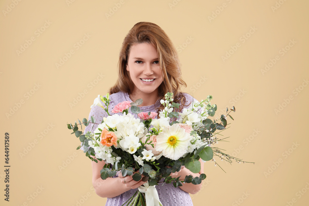 Beautiful woman with bouquet of flowers on beige background Beautiful woman with bouquet of flowers on beige background