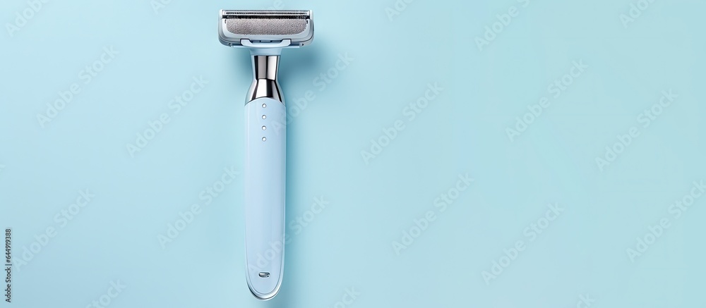 Mens razor isolated on a isolated pastel background Copy space for body care and shaving Mens razor isolated on a isolated pastel background Copy space for body care and shaving