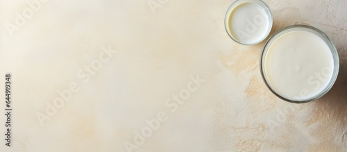 Fresh milk in a glass bottle isolated pastel background Copy space