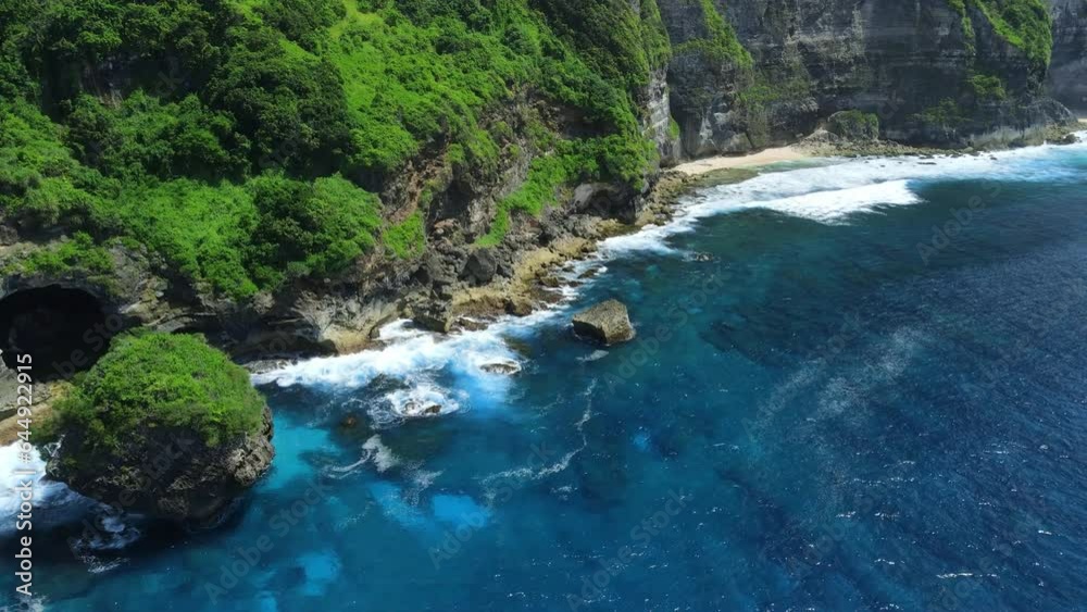 Landscape with scenic rocks and blue ocean with waves in Hawaii. Aerial view.