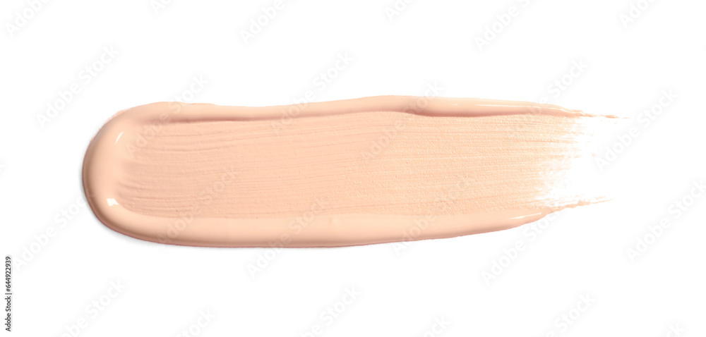 Fototapeta premium Smear of skin foundation isolated on white, top view