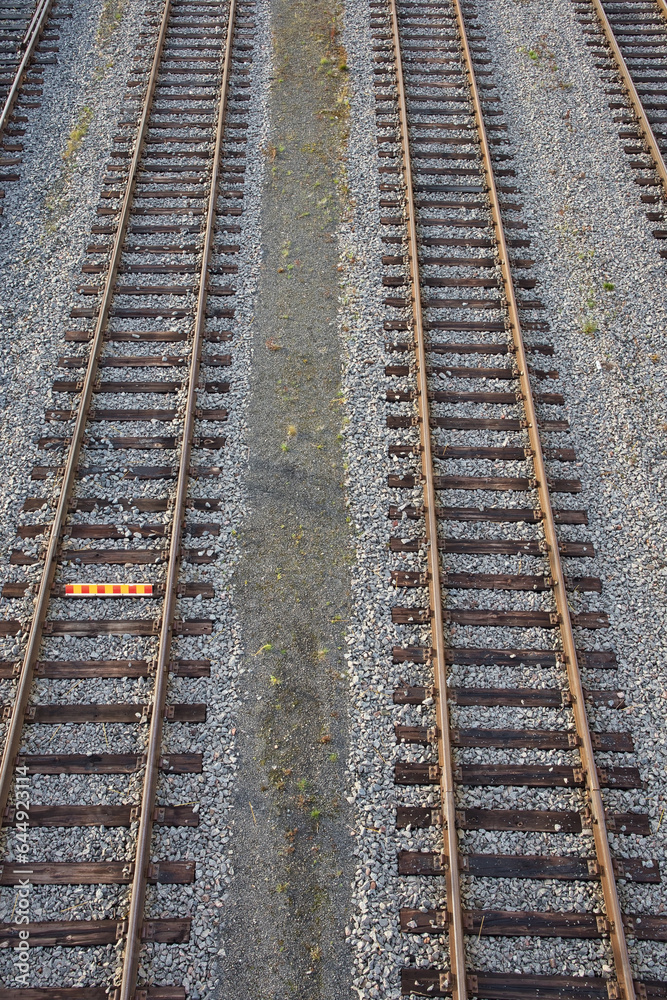 old railroad tracks with wooden baulks old railroad tracks with wooden baulks