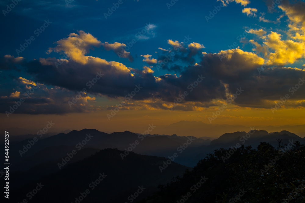 Peak of tropical forest mountain sunset sky with cloud nature landscape background