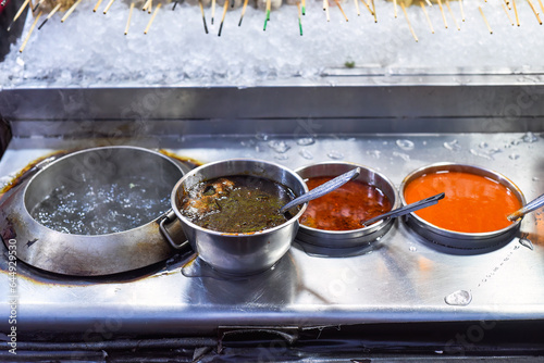 Several sauces in the Jalan Alor street food in Malaysia photo