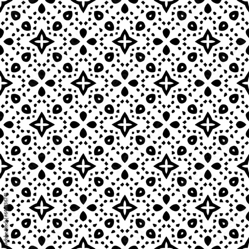 White background with black pattern. Seamless texture for fashion, textile design, on wall paper, wrapping paper, fabrics and home decor. Simple repeat pattern.