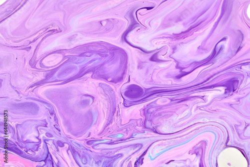 Exclusive beautiful pattern  abstract fluid art background. Flow of blending purple lilac paints mixing together. Blots and streaks of ink texture for print and design