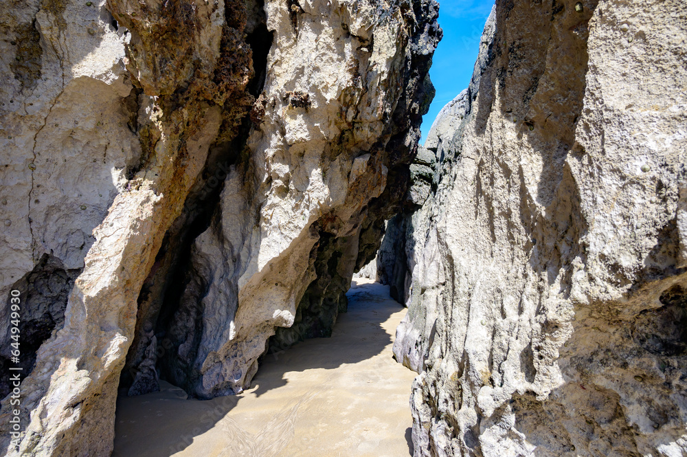 View on Playa de Palombina Las Camaras in Celorio, Green coast of Asturias, North Spain with sandy beaches, cliffs, hidden caves, green fields and mountains. View on Playa de Palombina Las Camaras in Celorio, Green coast of Asturias, North Spain with sandy beaches, cliffs, hidden caves, green fields and mountains.
