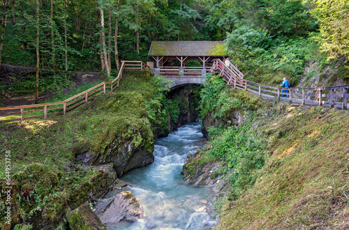 Access of the footbridges leading through the Sigmund Thun flume in Kaprun, Austria photo