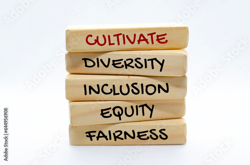 Cultivate diversity, inclusion, equity and fairness text on wooden blocks