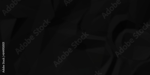 Dark crumple black paper wrinkled poster template ,blank glued creased paper texture background. black paper crumled backdrop background. used for cardboard and clarkboard.