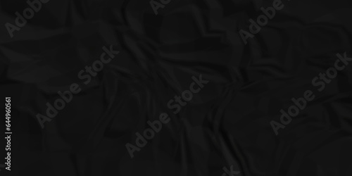 Dark crumple black paper wrinkled poster template ,blank glued creased paper texture background. black paper crumled backdrop background. used for cardboard and clarkboard.