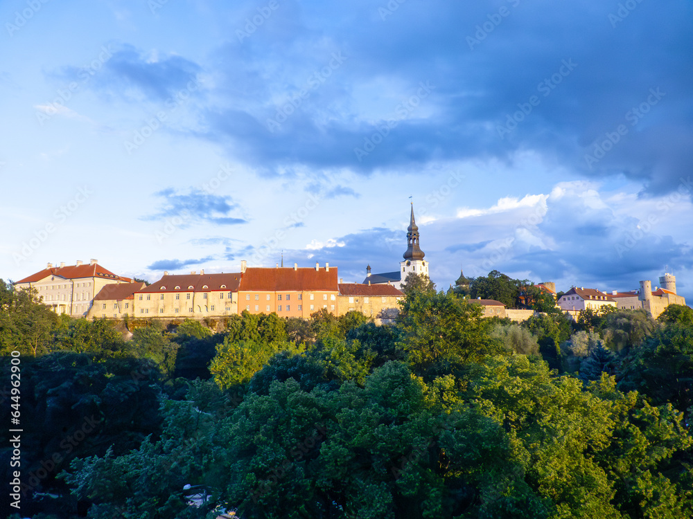 famous historic old Tallinn city wall in sunset with castle
