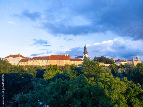 famous historic old Tallinn city wall in sunset with castle 