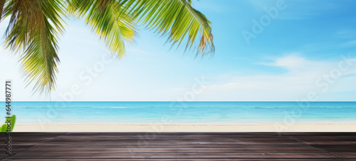Empty wooden table with white sand calm sea bay blue sky  Beautiful summer nature vacation island in the background with copy space  blank for text ads  and graphic design.