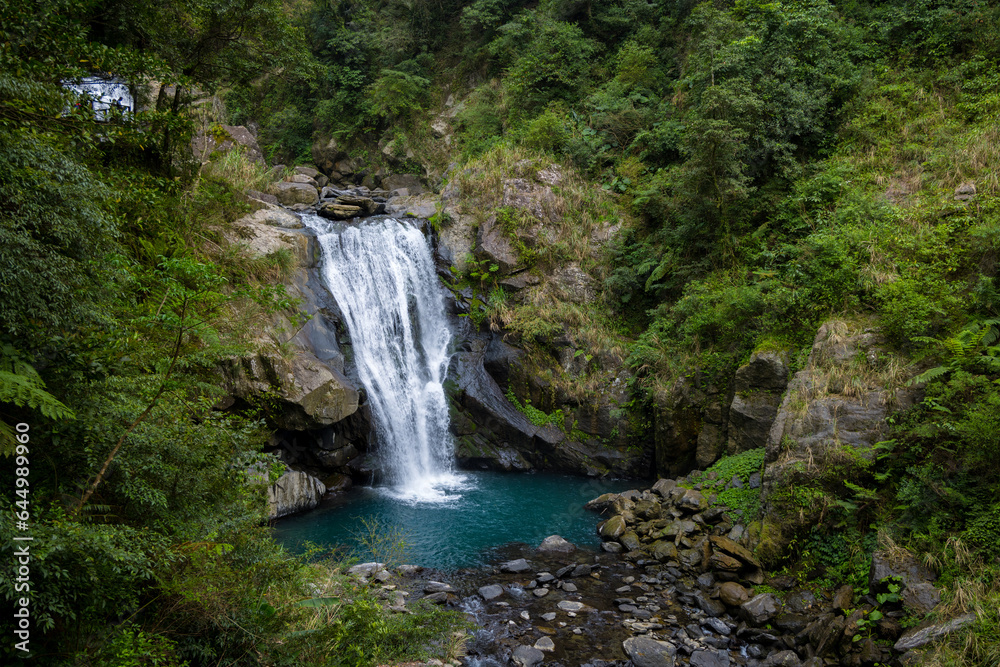 Forest waterfall in neidong national forest recreation area of taiwan