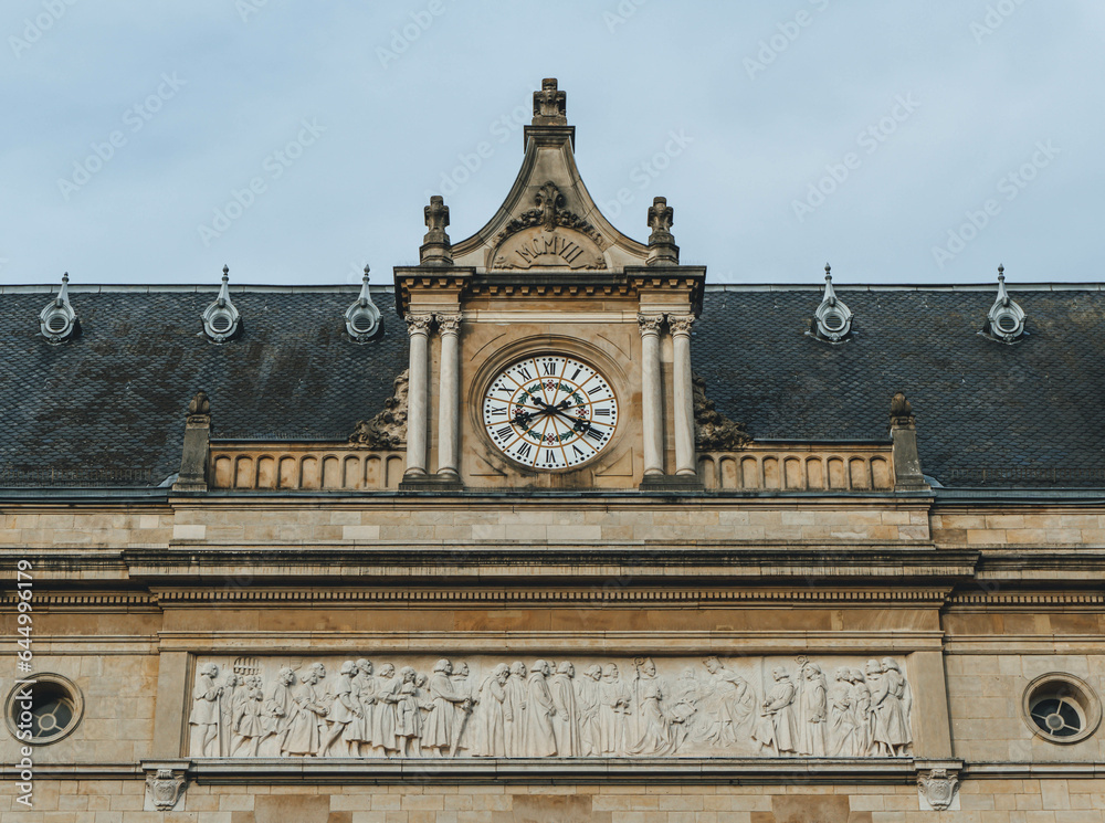 detail architecture in old town of luxembourg with big clock in center of the town