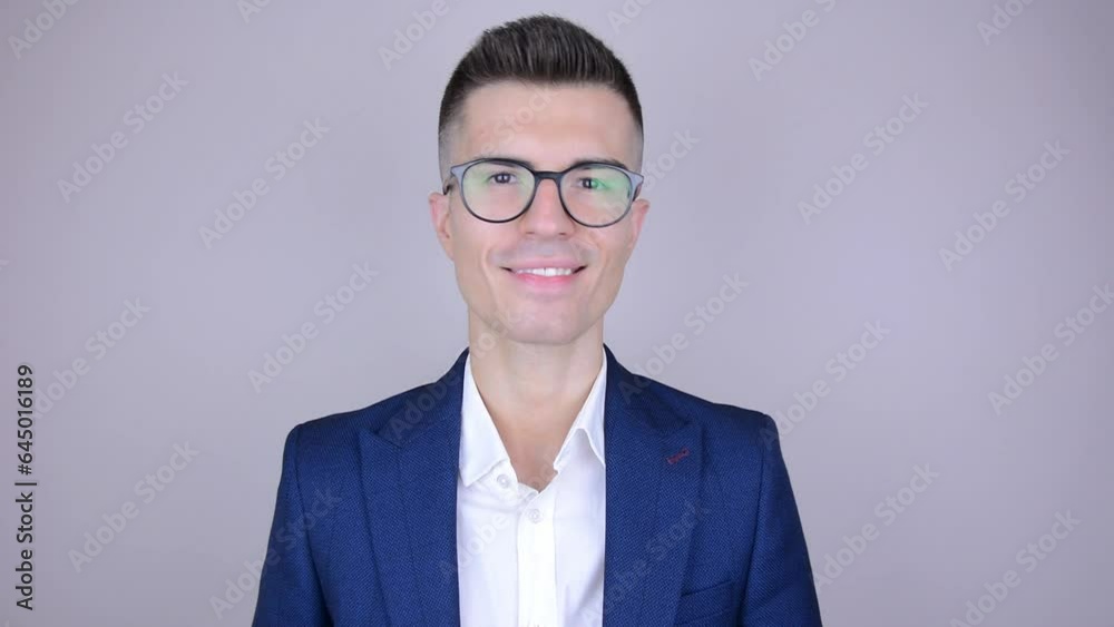 Confident and stylish smiling young man. Happy businessman or office worker concept. Confident and stylish smiling young man. Happy businessman or office worker concept.