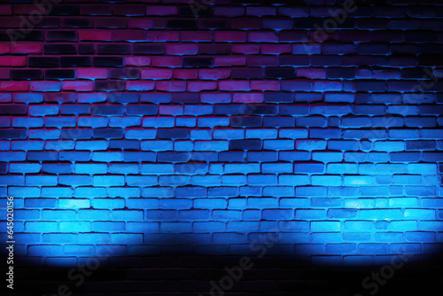 A Brick Wall With Blue And Red Lights On It