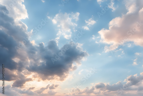 The background of sky and clouds In shades of pastel blue tones. The sky is bright, free and beautiful.