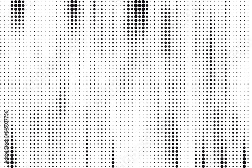 Abstract halftone dotted background. Grunge effect vector texture