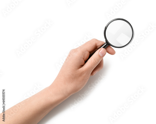 Female hand with mini magnifier isolated on white background