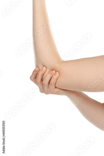 Cropped image woman with joint inflammation. Female's elbow on a white background